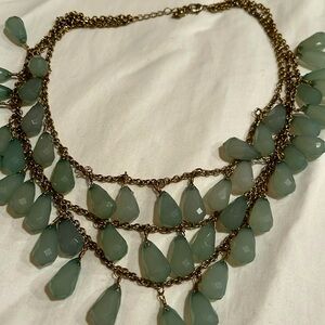 Necklace with green resin stones
